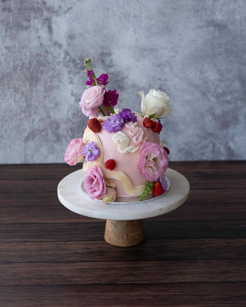 Decorative dome birthday cake with flowers 
